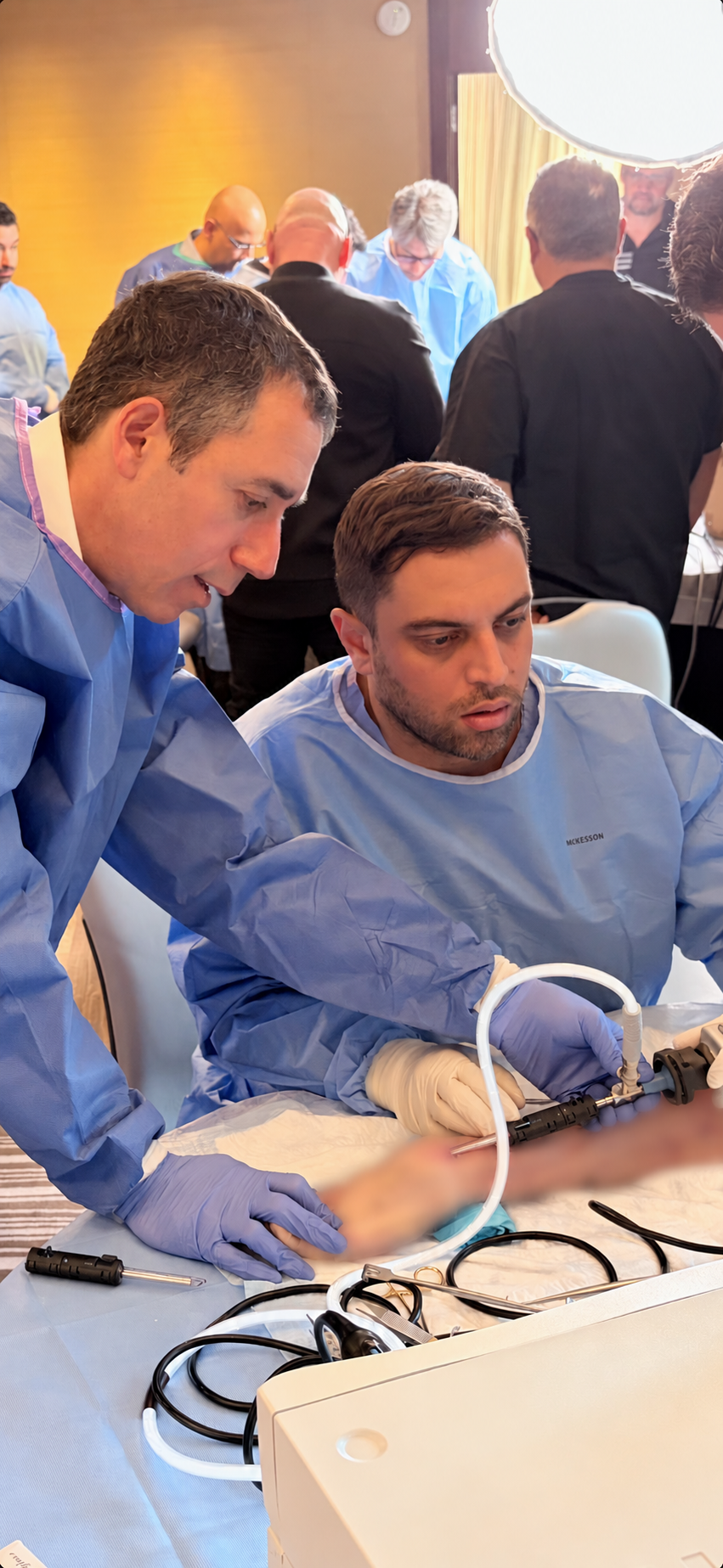 Surgeons practicing an endoscopic technique during an A.M. Surgical training lab